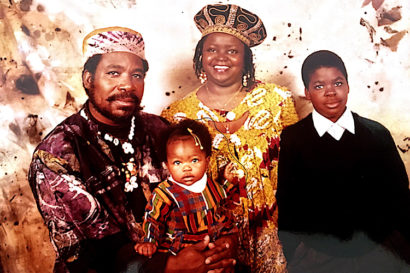 Malika as a baby with her family