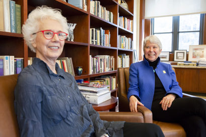 Carol Christ smiles while she looks at Carol Clover