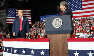 trump and hannity on stage
