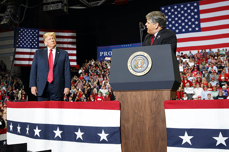 trump and hannity on stage