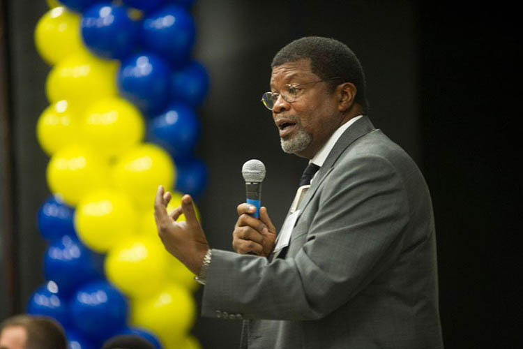 a man speaks to a crowd