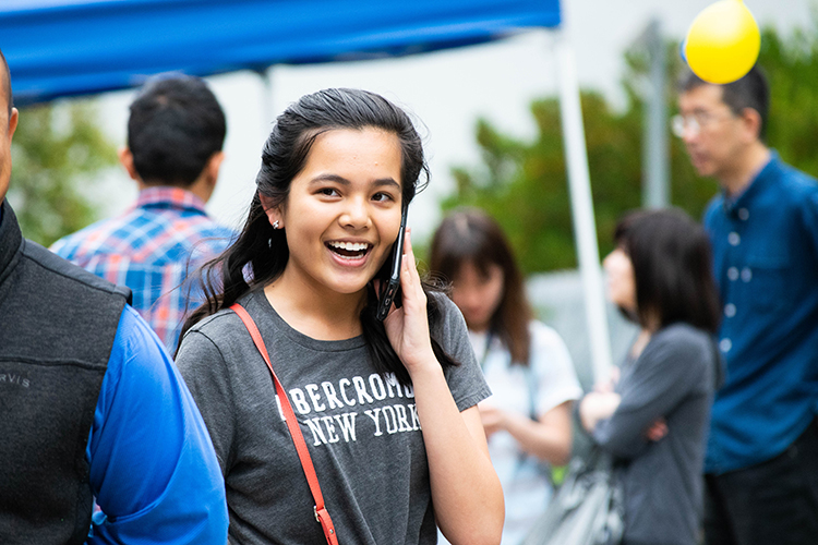 a student on the phone