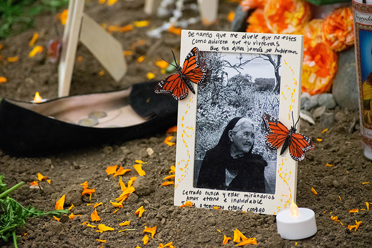 A framed photo of her grandfather's sister is part of Erika Ramos' altar