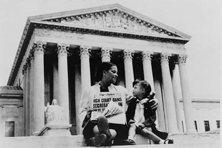 Nettie Hunt and her daughter, Nickie, sit on the U.S. Supreme Court steps in 1954