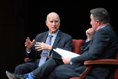 Jerry Brown talking on stage with KQED's Scott Schafer