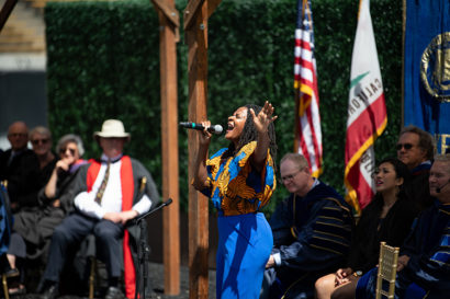 Takiyah Franklin singing at new student convocation