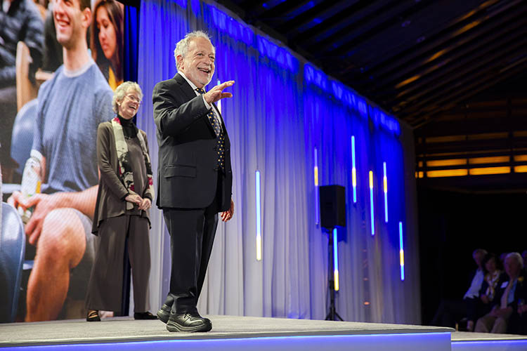 Reich and Hochschild stand on stage