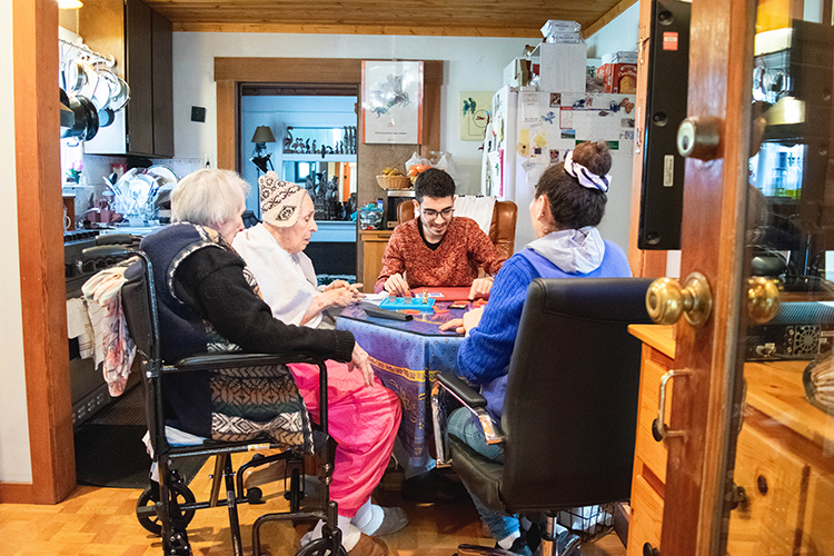 People playing games around a table