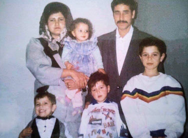 Maryam Karimi as a 1-year-old with her family