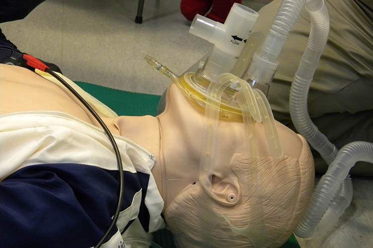 a mannequin with a CPAP mask on