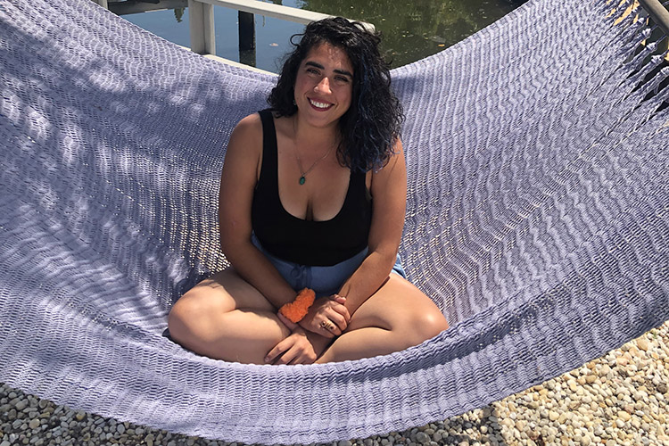 Berkeley Ph.D. student Giovanna Figueroa rests in her cousin's backyard in St. Petersburg, Florida, after leaving Peru during the COVID-19 crisis.