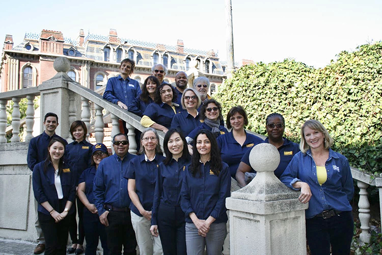 The counseling and programs team at Berkeley's Career Center standing on steps outside south hall.