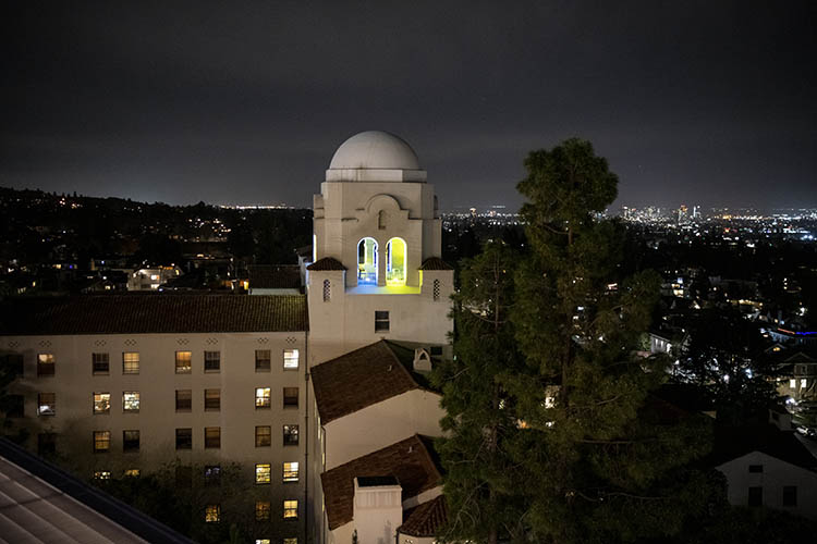 The dome on International House lit up in Blue and Gold