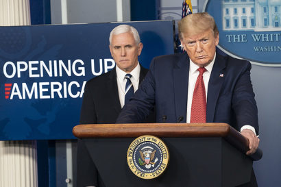 Vice President Mike Pence at left and President Donald Trump at a White House press briefing on the COVID-19 pandemic