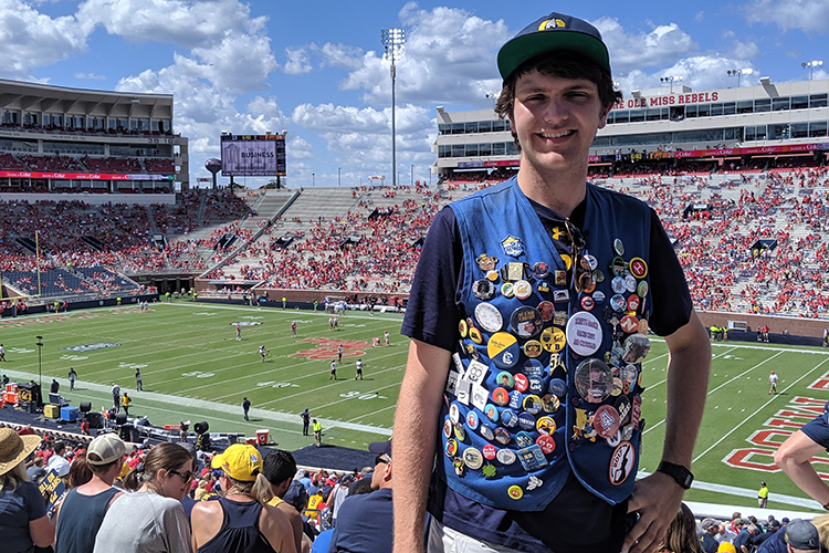 Nick Pickett poses at a football game