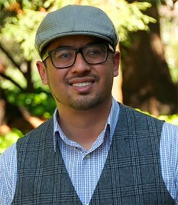 Assistant Vice Chancellor for Student Equity and Success Fabrizio Mejia smiles for a photo.