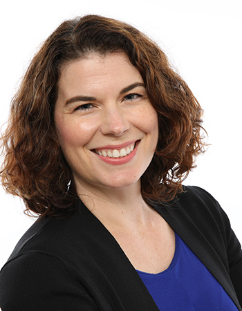 Gina Daly, UC Berkeley's federal government director, smiles for the camera