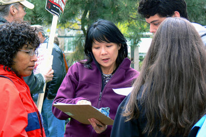 Political canvasser engages a prospective voter in conversation