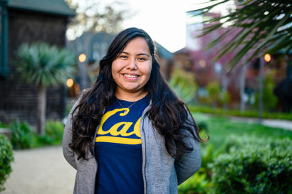 Alumna Marilyn Luna, wearing a Cal t-shirt, is a student coordinator for Golden Bear Orientation