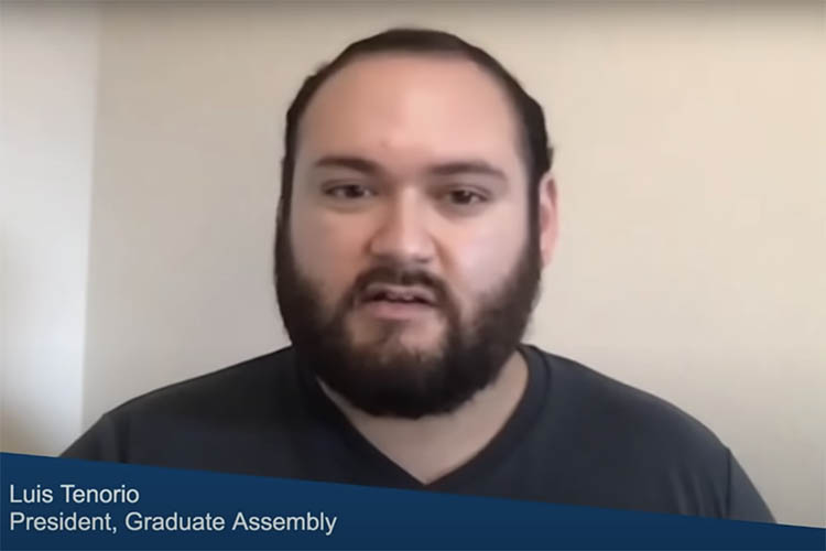 luis tenorio looks at ther camera during a livestreamed event