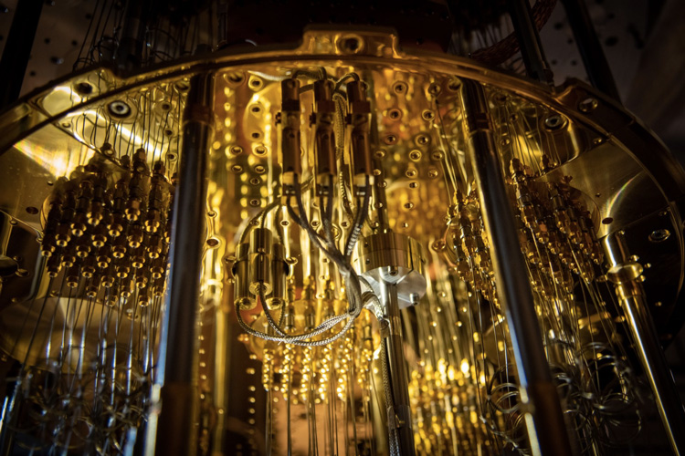 a gold-plated refrigerator used to cool quantum processors