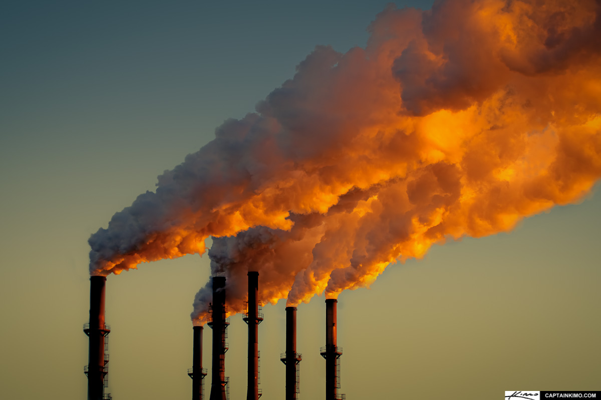 Smoke stacks rising into the air from a nuclear plant