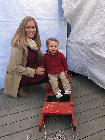 Sarah Cranford, the great-great-granddaughter of former UC President David Barrows, poses with her son, Nicholas, at the family's annual Christmas Eve celebration.