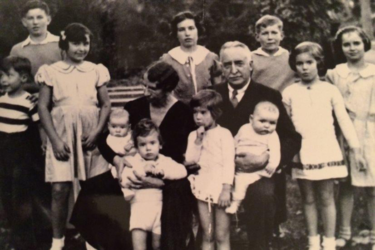 David Barrows, former UC president, is surrounded by his youngest relatives at a Christmas Eve celebration in 1935