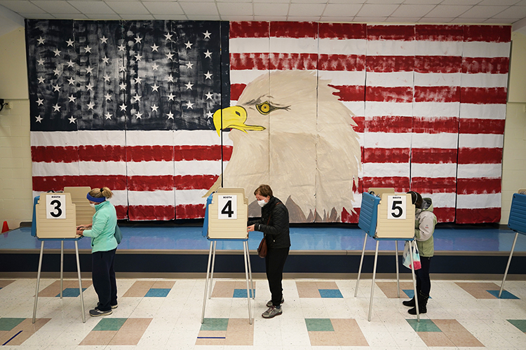 three people voting