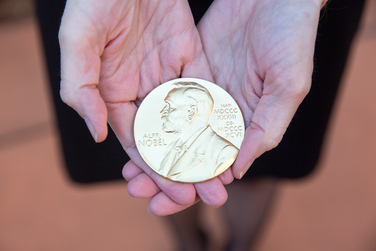 Doudna holding Nobel Prize gold medal