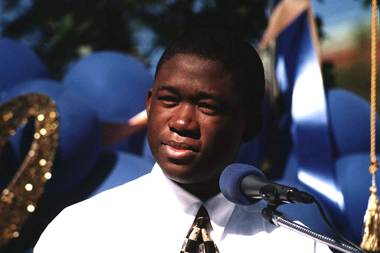 ASUC President Adewale "Wally" Adeyemo speaking at 2002 commencement