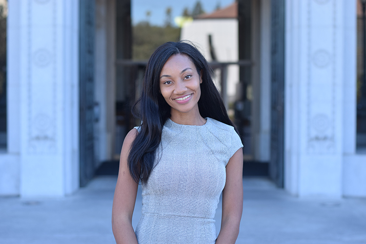 A portrait of Cheyenne Overall, a 2019 Berkeley Law graduate who is now an attorney. She worked on the committee that recommended unnaming Boalt Hall.l