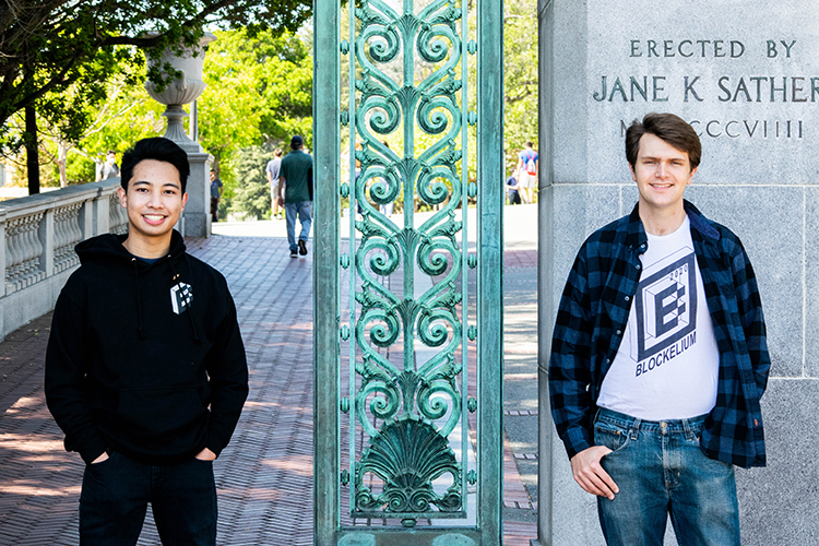 Christian Nisperos, president of the Blockeley student club, and alumnus Nick Pickett, on Blockeley's alumni board, stand in front of Sather Gate