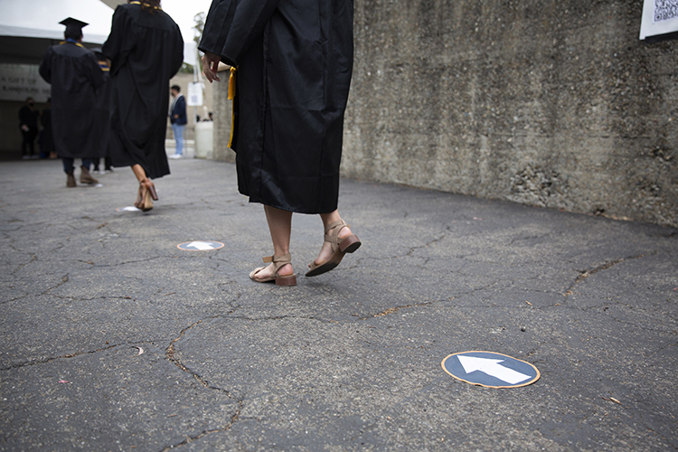 Arrows pointing the way to the Greek Theatre stage are on the ground and also serve to social distance students during the pandemic.