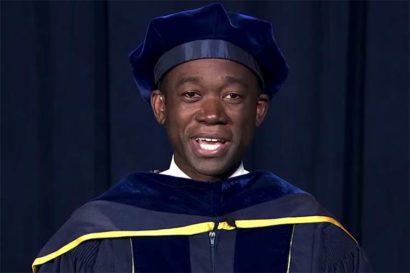 wally adeyemo in cap and gown