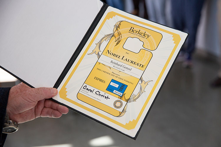 A close up of the Nobel Laureate Free campus parking pass, which never expires.