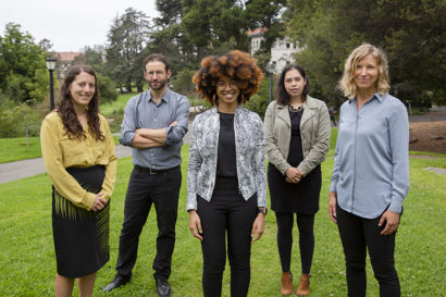 The five new members of Berkeley's Climate Equity and Environmental Justice cluster stand together and look at the camera.