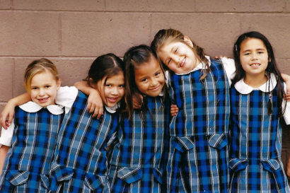 elizabeth as a 6-year-old with her schoolmates in their school uniforms
