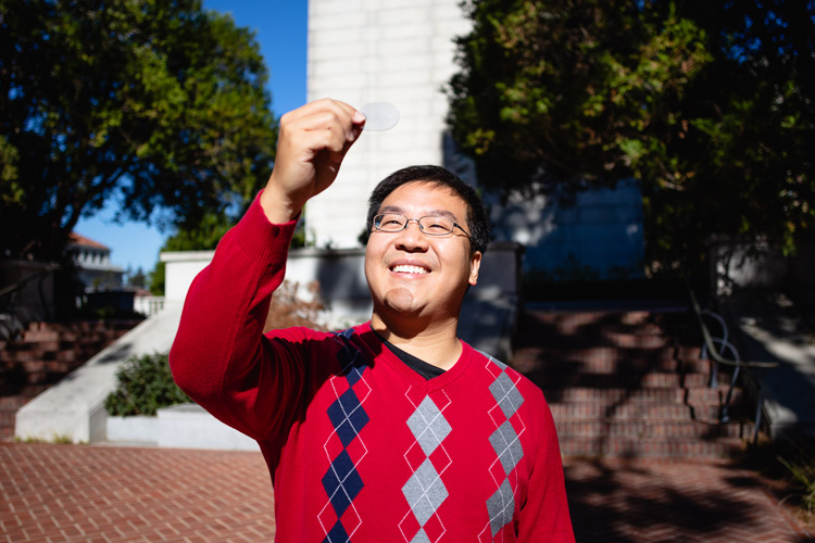 Norman Yao holding a synthetic diamond