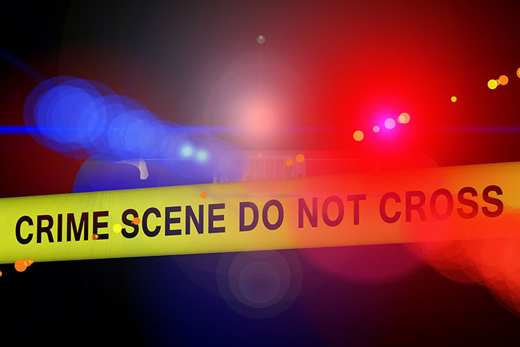 illustration of yellow crime scene tape in front of red and blue police lights