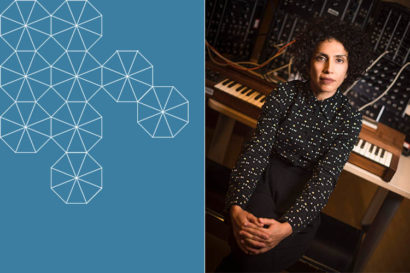 Roshanak Kheshti sitting in front of a keyboard
