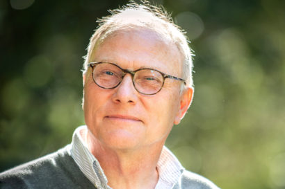 portrait of David Card outside