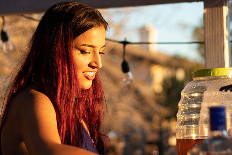 Kashish Juneja serving boba.