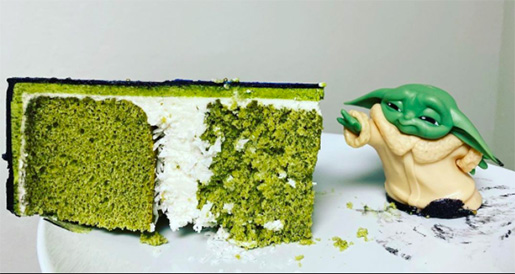 Green cake with Yoda figurine.