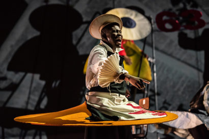 person performs on stage