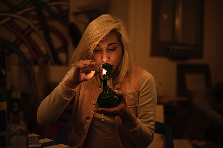 A photo shows a woman smoking