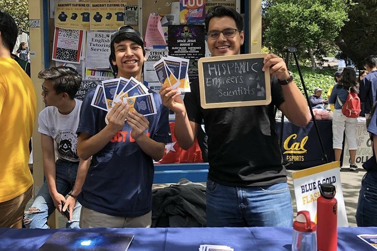Alberto Ibarra and Jose Cortes (Data Science B.A.) distributed flyers at Sproul Hall for Hispanic Engineers and Scientists (HES) student organization.