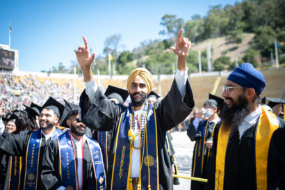 a sikh man celebrates his graduation
