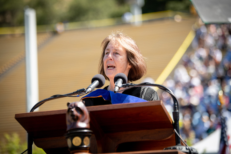 State Senator Nancy Skinner speaks at a podium