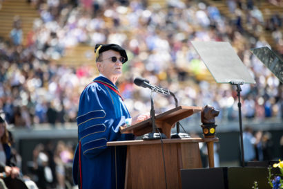 randy schekman speaks at a podium